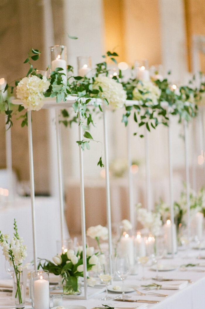 High wedding floral centerpieces in white and green