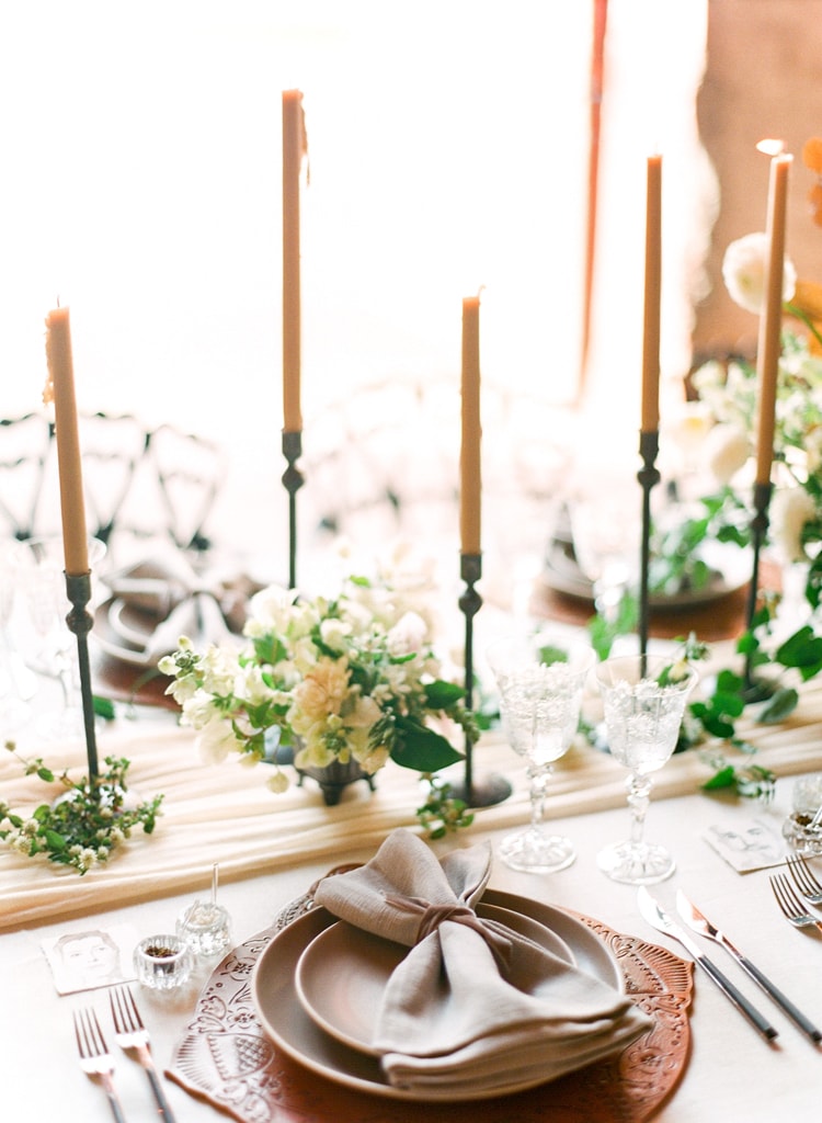 Floral, candle, and china wedding details