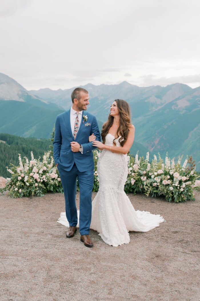 Bride and groom walking down the aisle at the Little Nell in Aspen