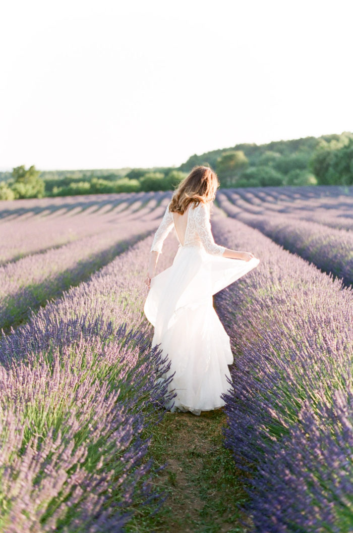 Bride in a field of lavender at a destination wedding in Provence France