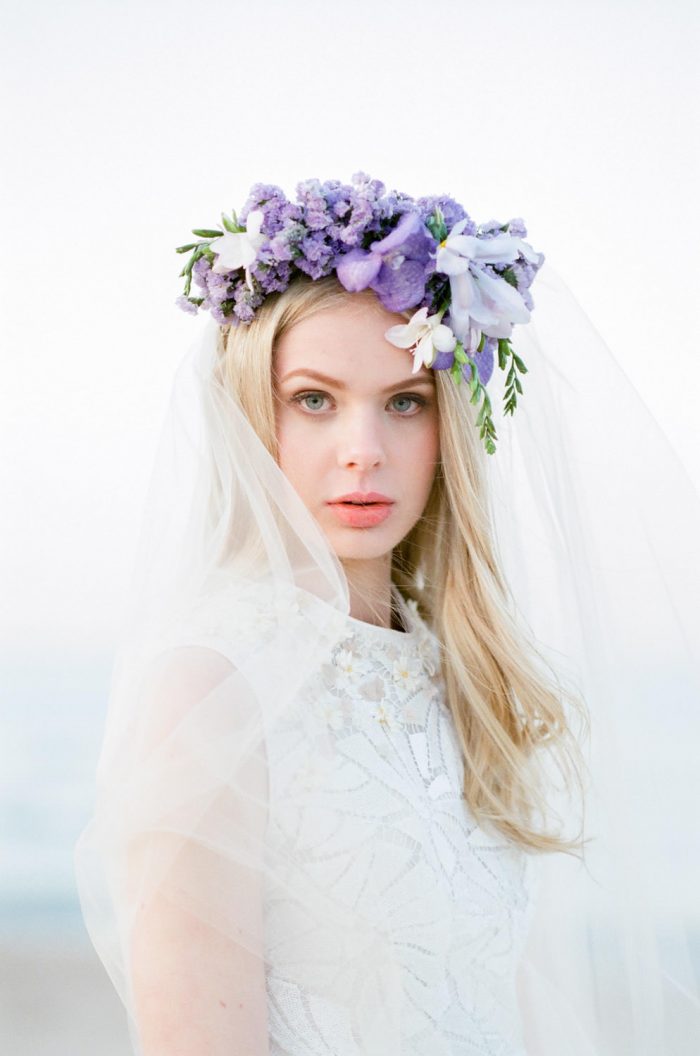 Lake Dillon bride wearing a unique purple flower crown and veil