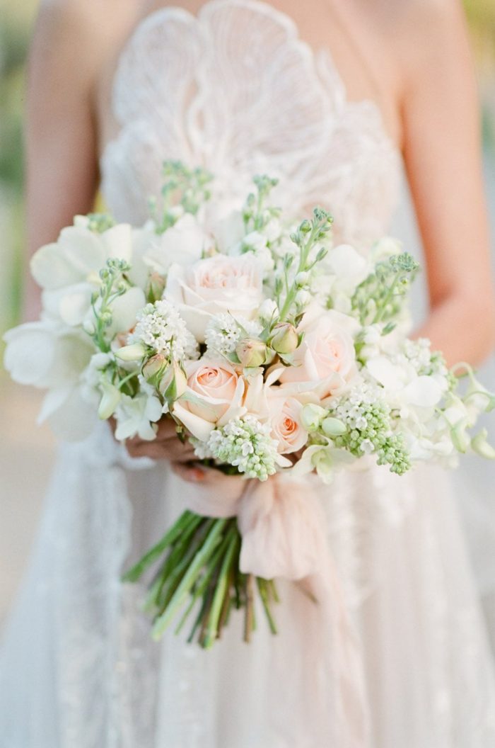 Bride holding a pastel bouquet in Provence