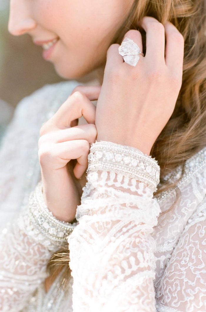 Bride showing her jewelry at the St. Regis in Aspen