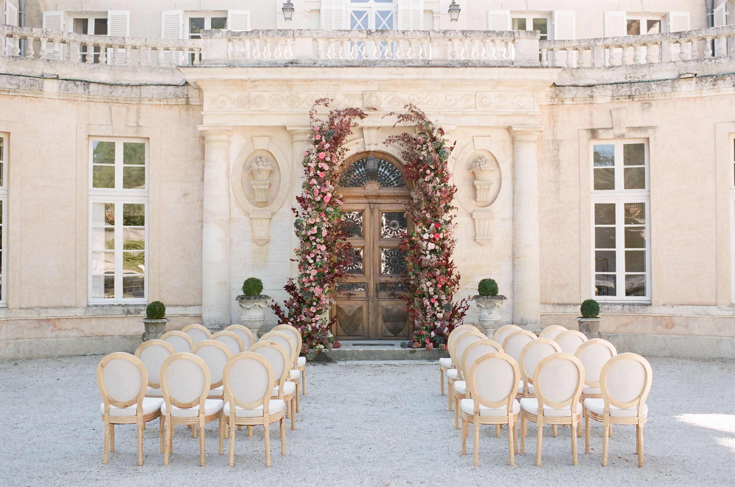 Wedding ceremony decor in front of Chateau Martinay in Provence