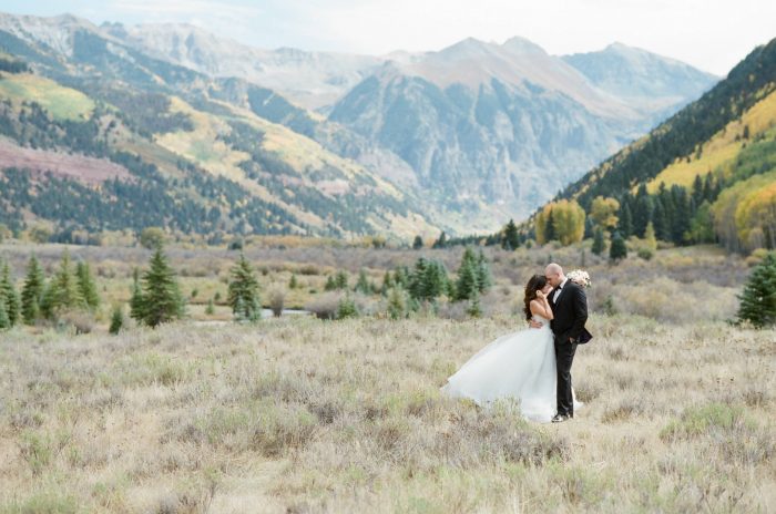 Wedding couple in Telluride in front of stunning mountain views