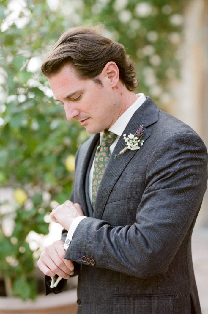 Groom getting ready for his wedding at Borgo Pignano in Tuscany