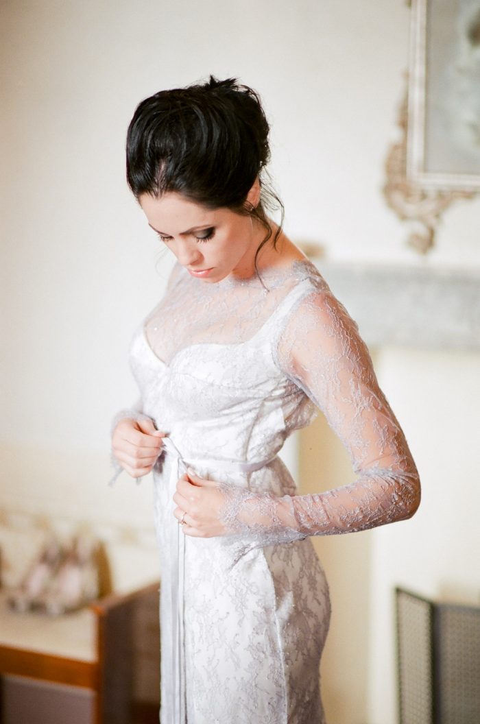Bride getting ready for her wedding at Borgo Pignano in Tuscany with Sposiamovi Events