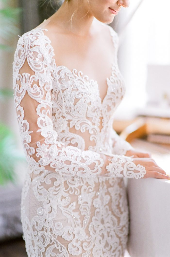 Bride wearing a lace Berta Bridal wedding dress
