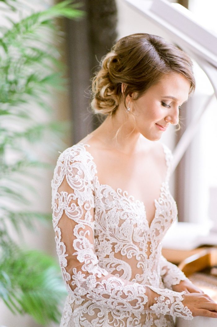 Bride wearing a lace gown from Berta Bridal at her Colorado wedding
