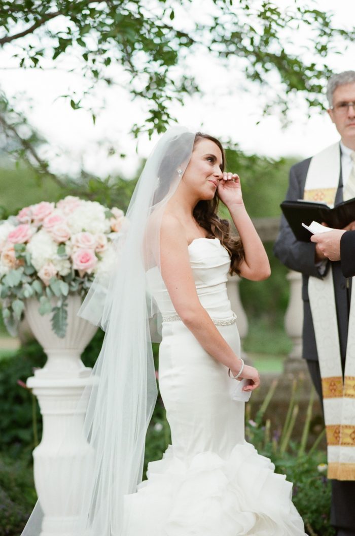 Bride wearing a mermaid shaped Vera Wang dress at a Chicago Botanic Garden wedding