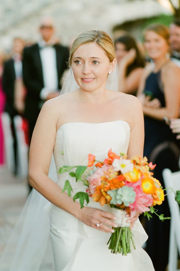 Bride walking down the aisle at Desert Mountain Golf Course in Scottsdale