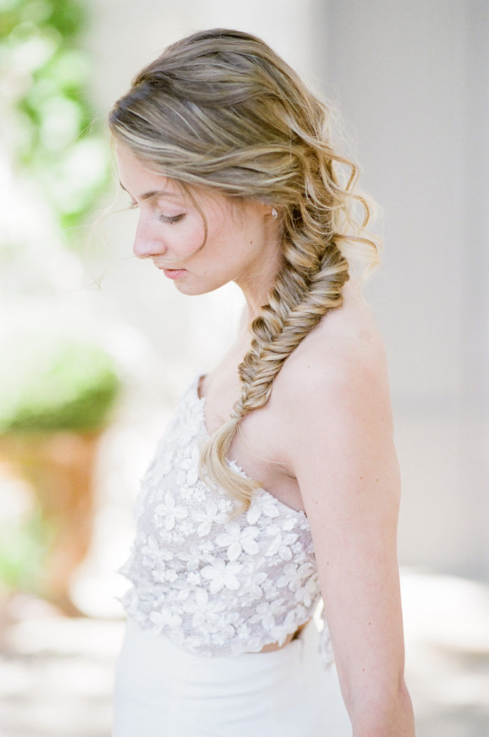 Woman with a fishtail braid on her honeymoon in Provence