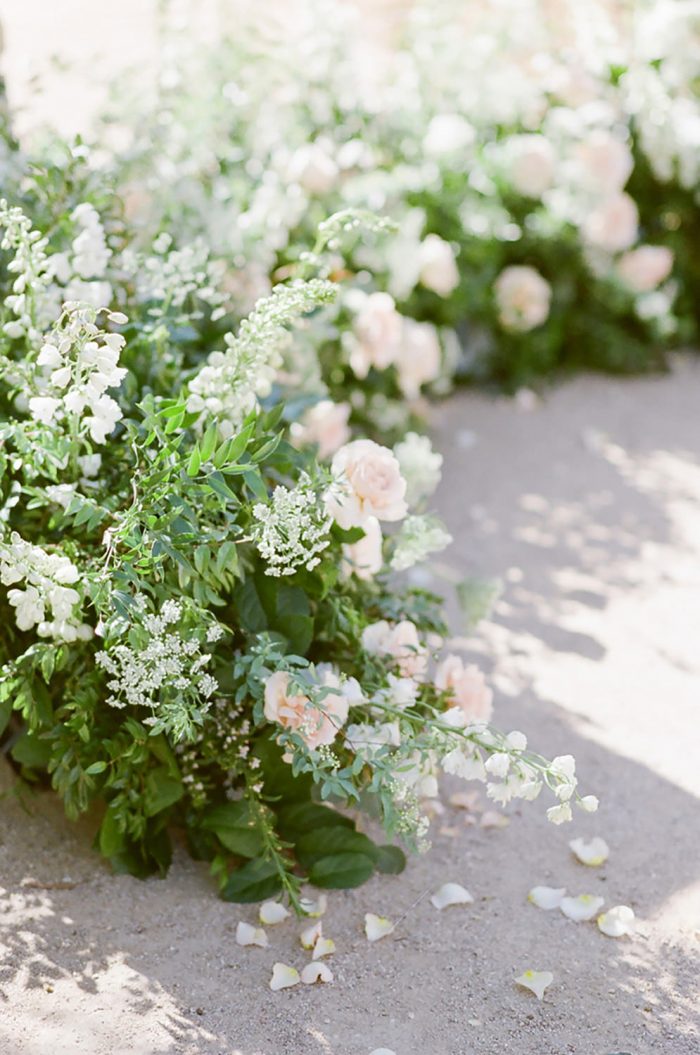 Curved floral decor at a wedding ceremony at the Springs Preserve in Las Vegas
