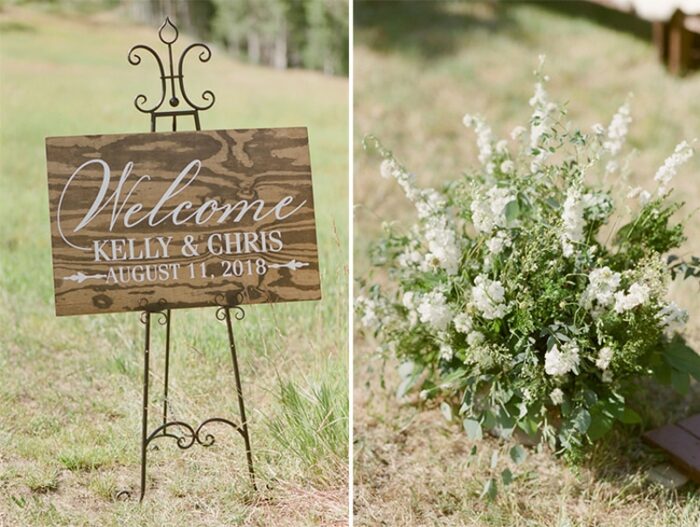 Welcome sign and white floral arrangement at an outdoor wedding ceremony at Eaton Ranch in Vail