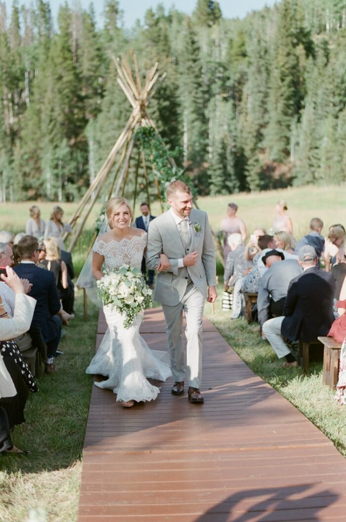 Couple walks down the aisle following their Vail wedding ceremony