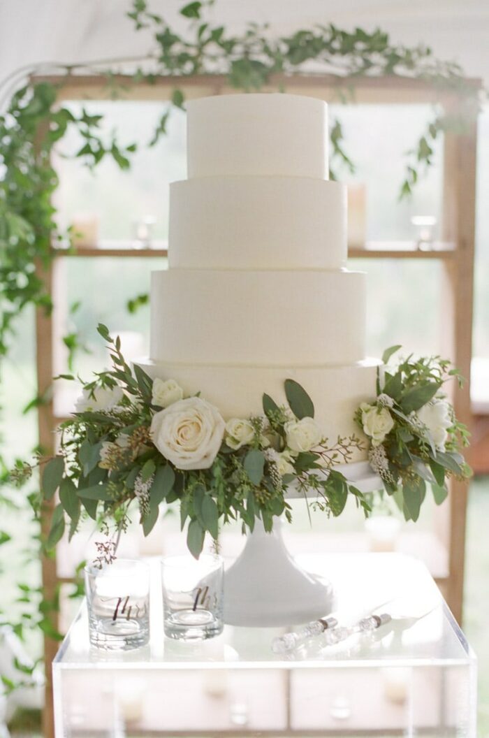 Cake display at an outdoor reception at Eaton Ranch in Vail