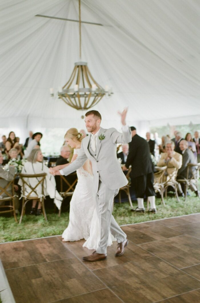 Couple dancing at their tented wedding reception at Eaton Ranch in Vail Colorado