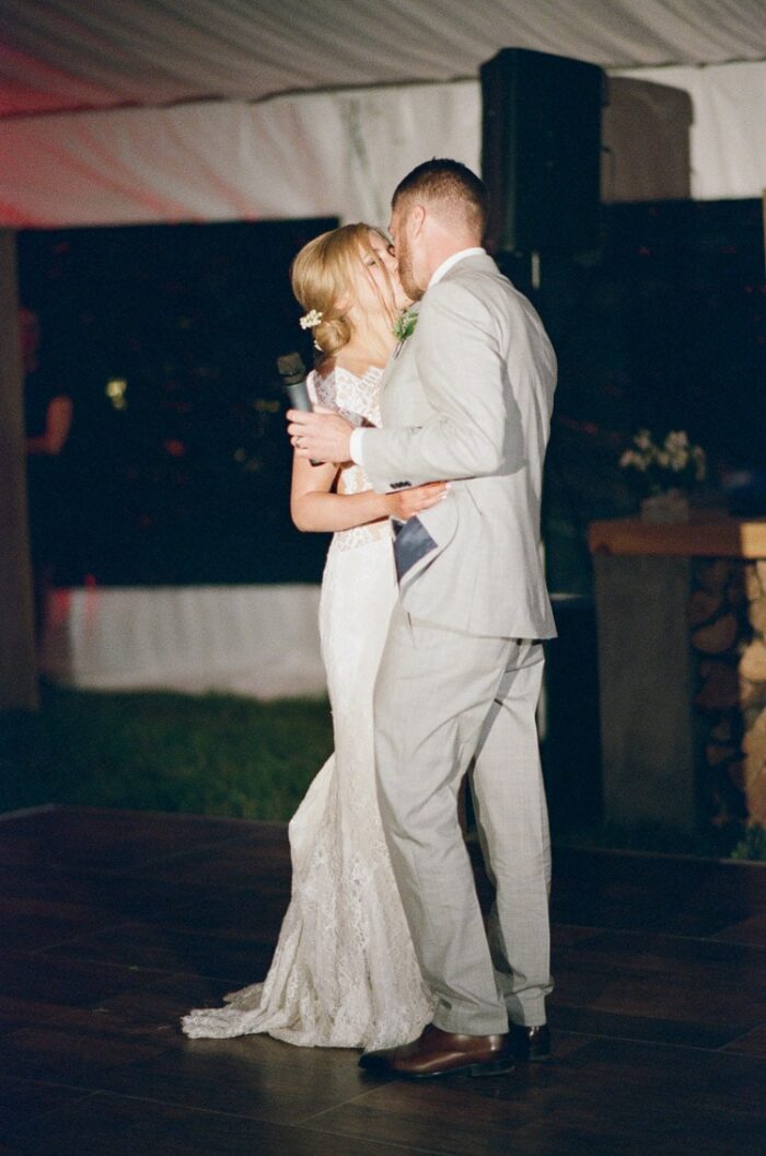 Bride and groom share a dance during their wedding reception at Eaton Ranch in Vail