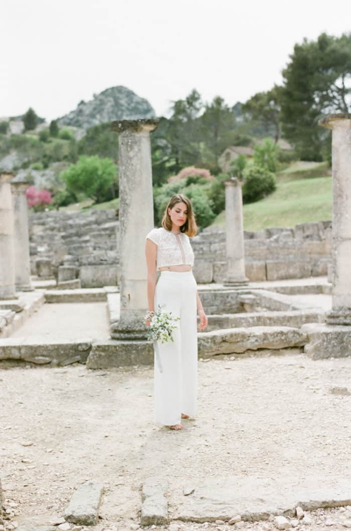 Bride standing at Glanum Ruins in Provence
