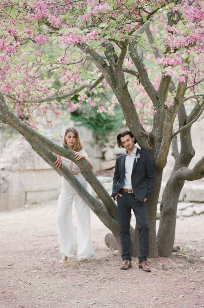 Bride And Groom Standing At Tree At Glanum Ruins