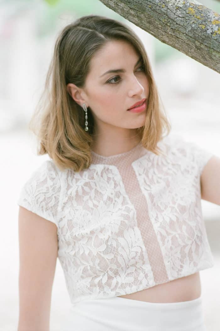 Bride in her two-piece lace outfit from Manon Gontero