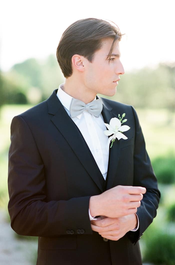 Groom wearing black suit At Le Clos Saint Esteve