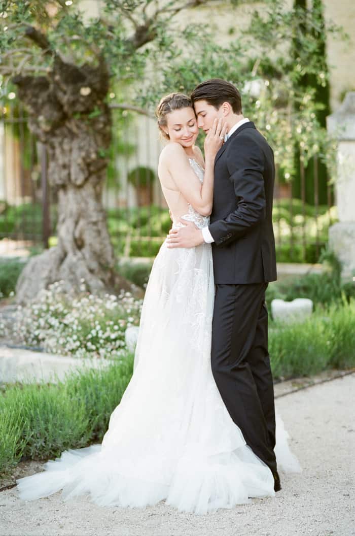 Styled soiree of romantic wedding of couple embracing each other