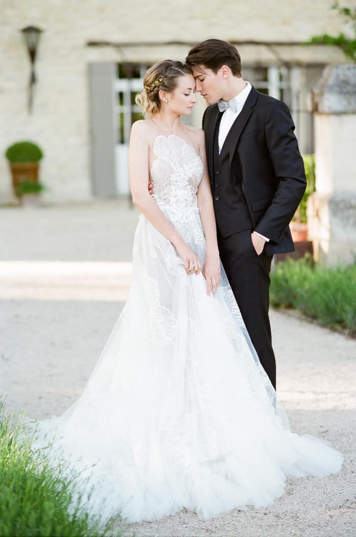Man and woman facing close to each other romantically