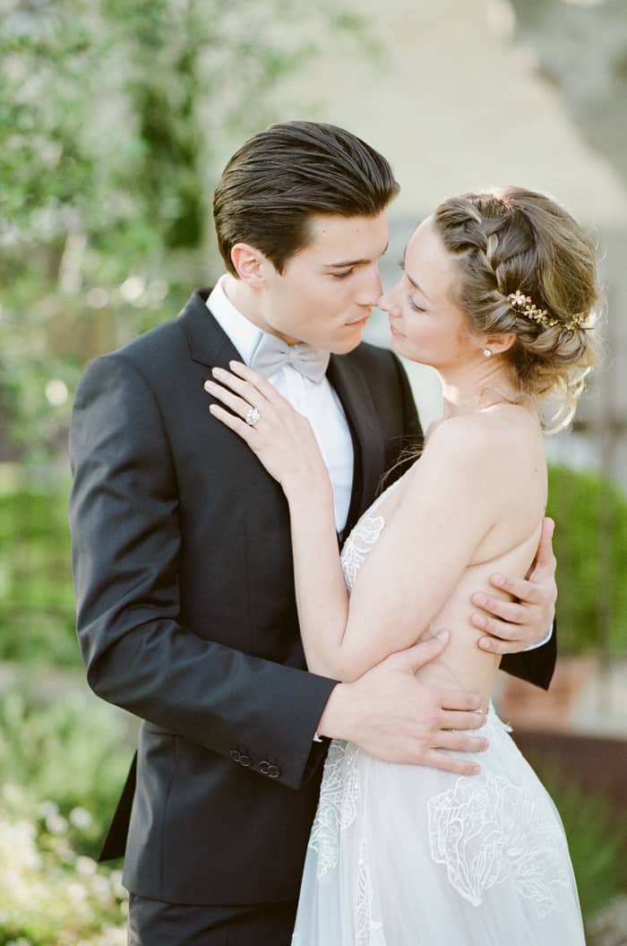 Engaged couple embracing
