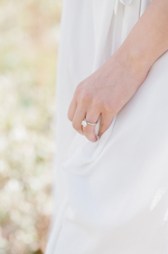 Close up of engaged woman wearing wedding ring