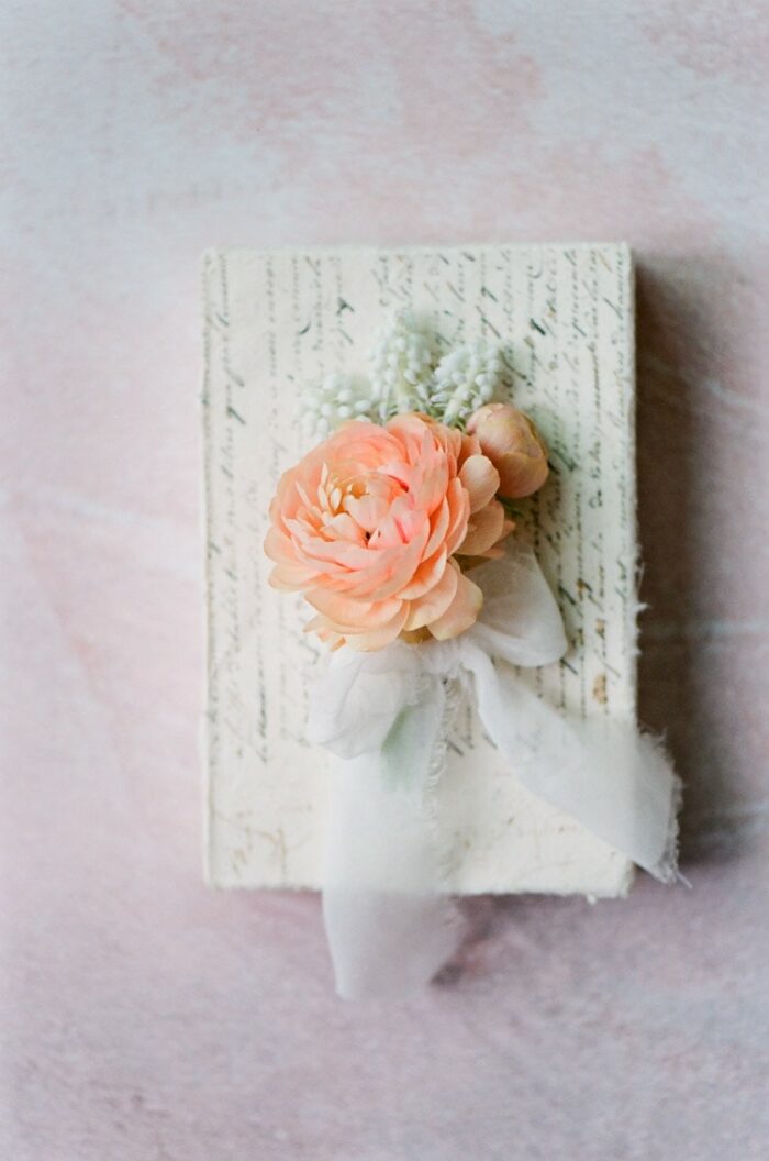 Coral flower with white ribbon