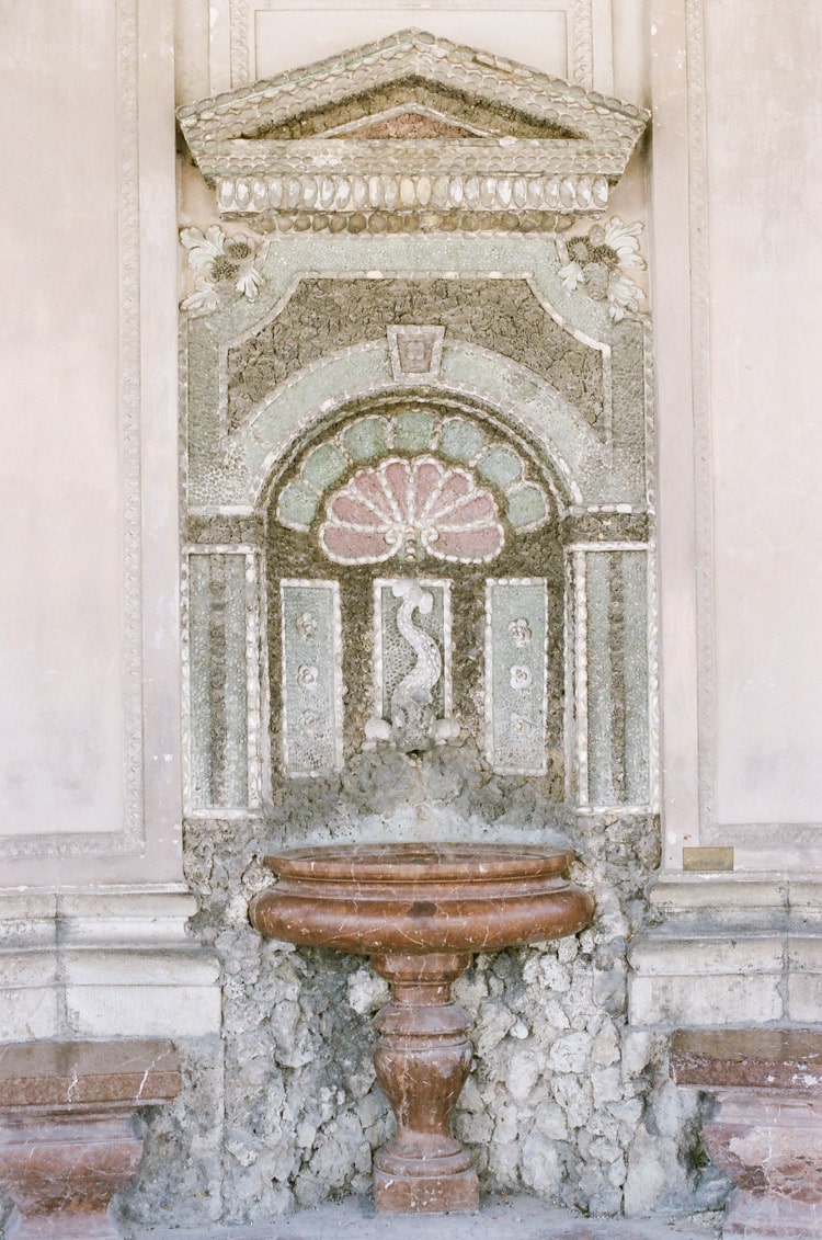 Fountain in Munich featuring pink and green tile work