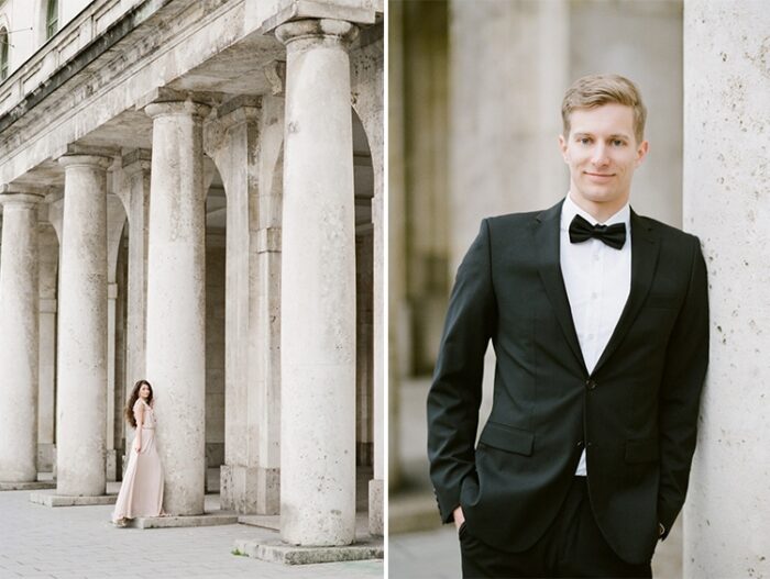 Engagement portraits in front of old columns in Munich