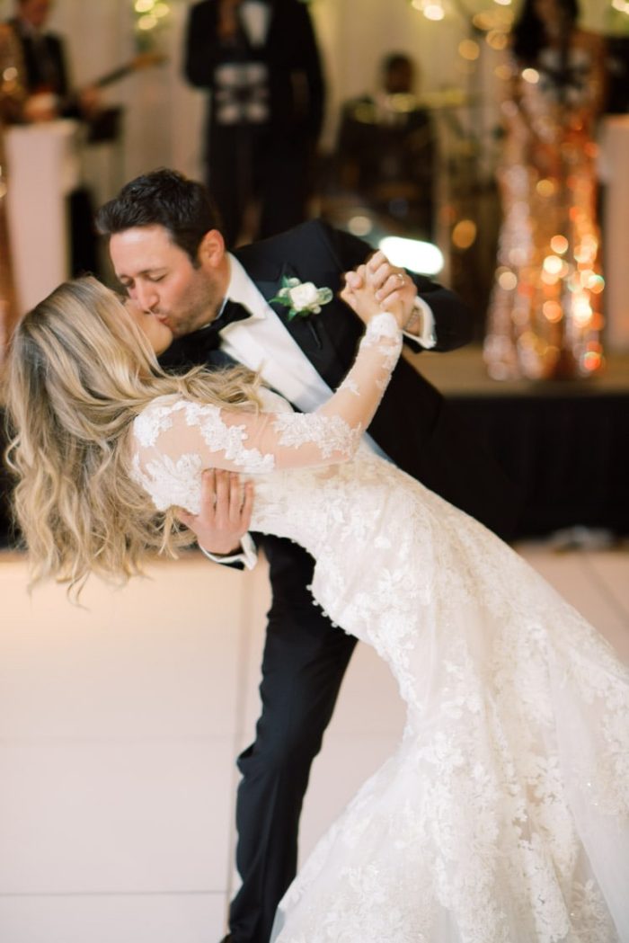 First dance at wedding reception with kiss