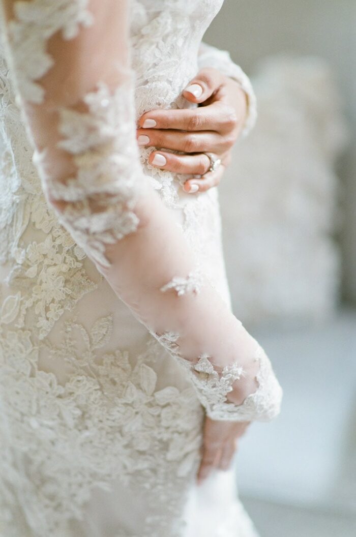 Custom wedding dress with sleeveless bodice lace fabric