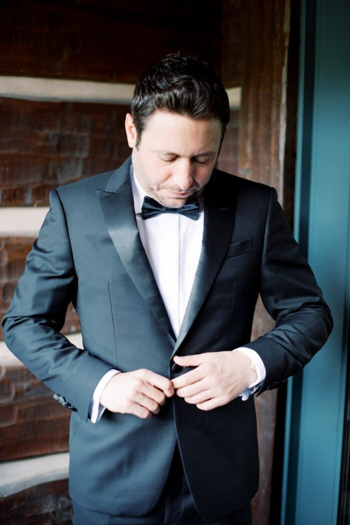 Groom getting ready on wedding day