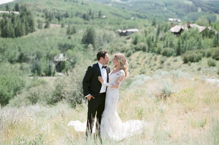 Man and woman facing close to each other romantically