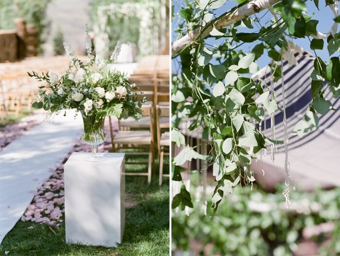 Large vase of flowers on the left and chuppah wedding canopy on the right