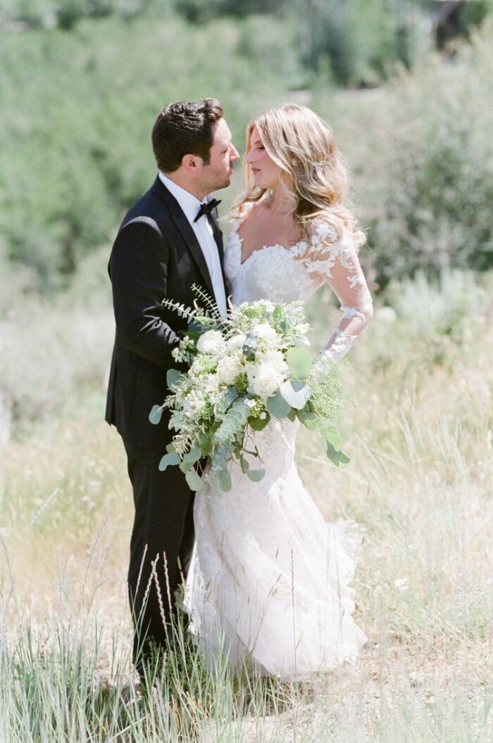 Man and woman facing close to each other romantically