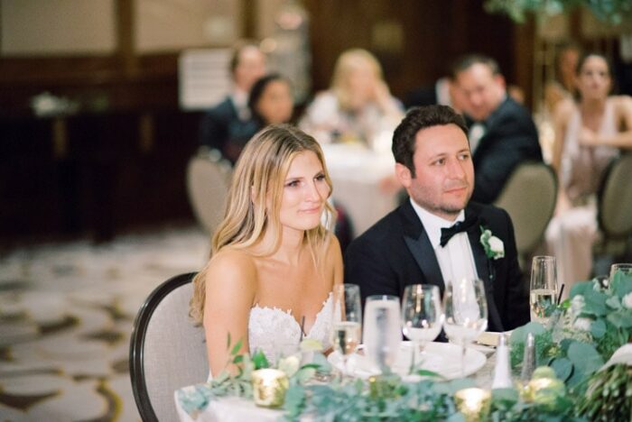 Married couple sitting together at table