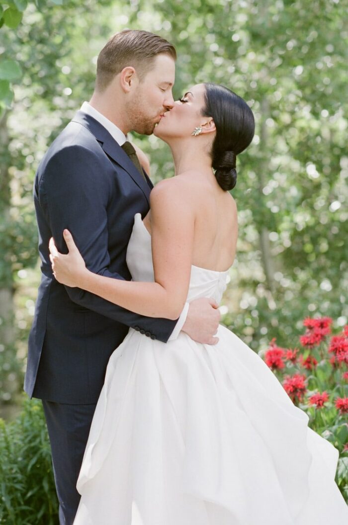 Portrait of Bride & Groom kissing