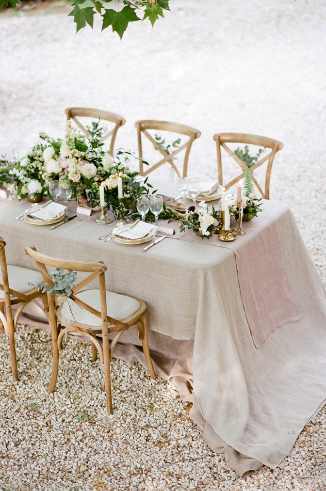 Provencal wedding dinner table with natural elements reflecting colors of Provence