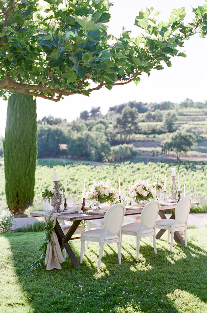 Wedding table outside with a view of the French landscape