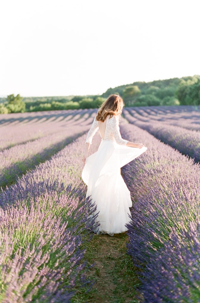 Bride dancing in the lavender fields of Provence in France