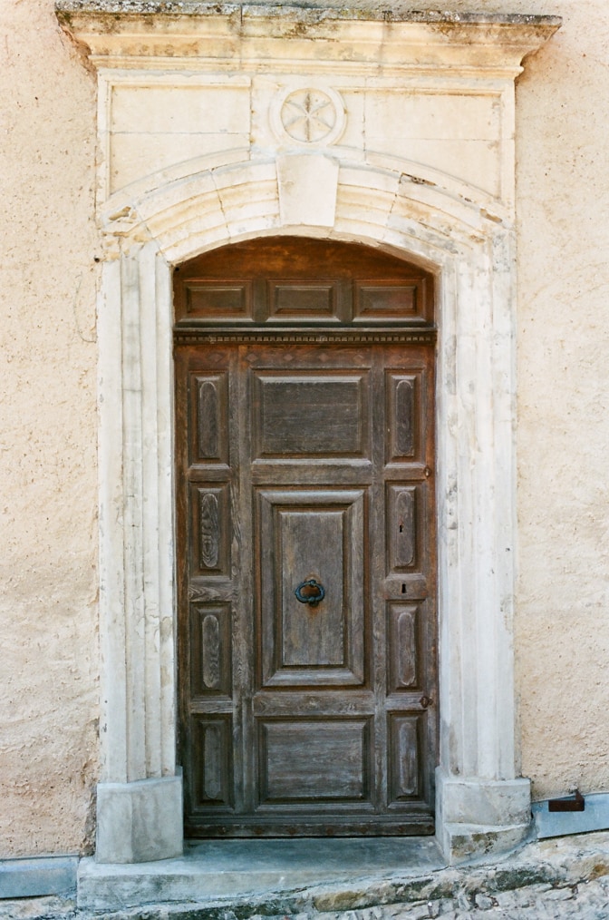 An old ornamental door at Oppède le Vieux in Provence, France