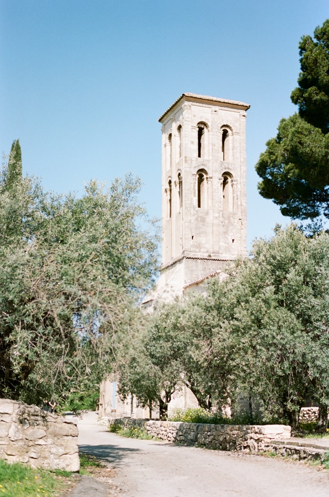 Venasque's church tower in Provence photographed by luxury destination wedding photographer Tamara Gruner