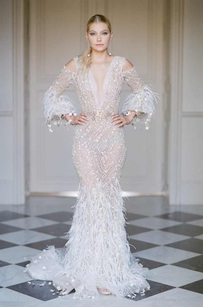 Bride in her Ziad Nakad gown standing in the hallway of Chateau Martinay