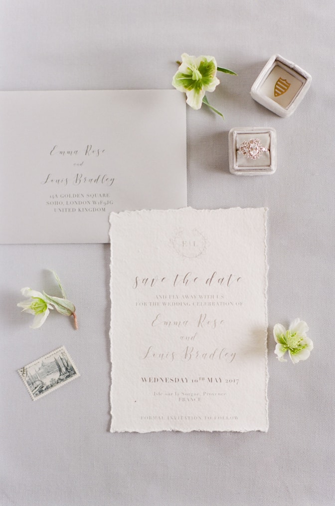 Closeup of invitation suite and fine jewelry details