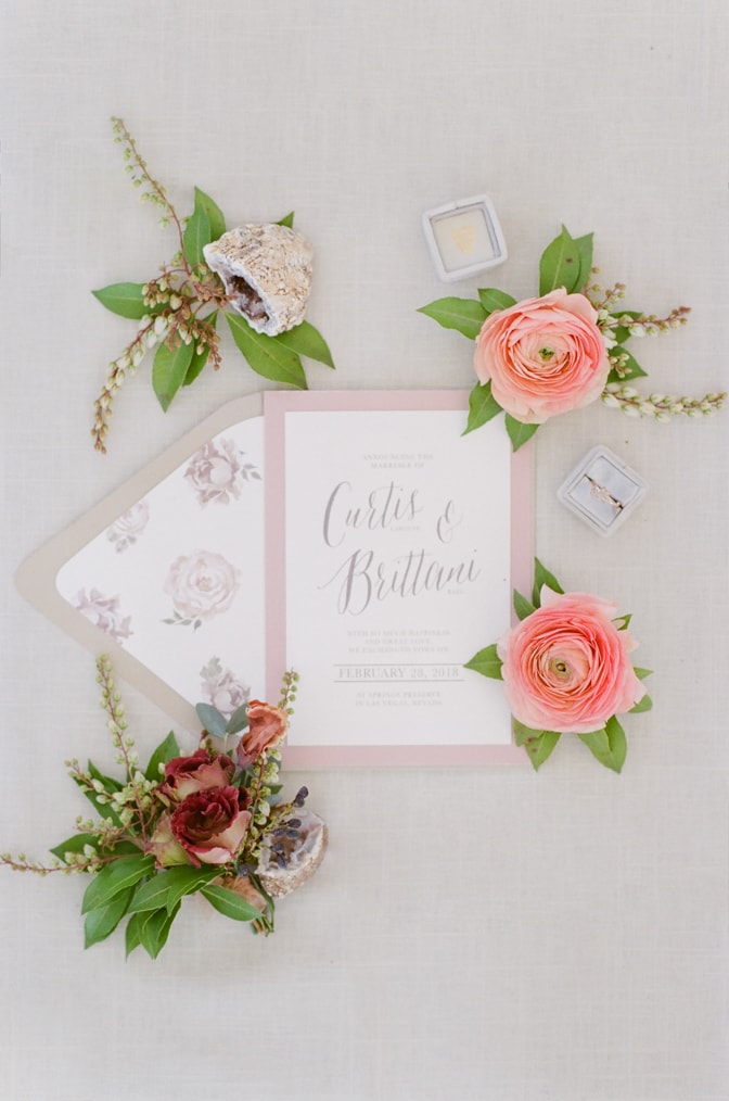 Flatlay of luxury romantic wedding invitation