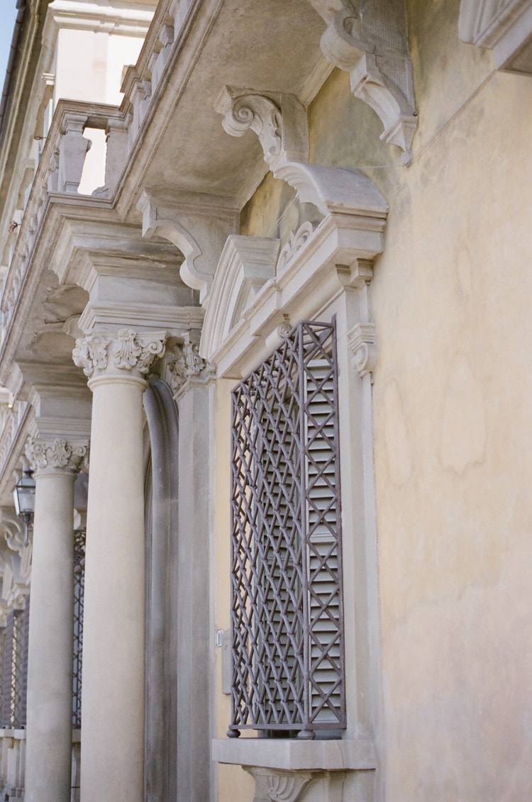 A luxury destination photographer's guide to Florence with a close up of a building's columns